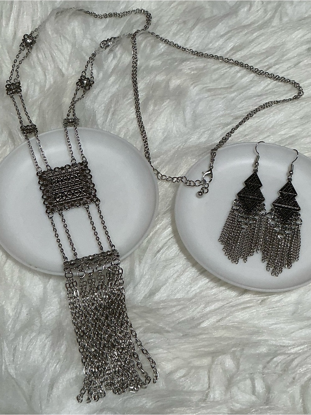 Beautiful silver-tone long statement necklace with matching dangle drop earrings